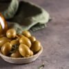 ripe green olives healthy food on the table